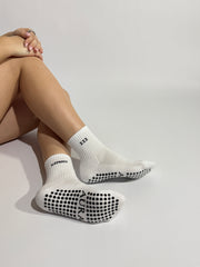 Close up on white 222 angels number Pilates grip socks showing the premium quality
